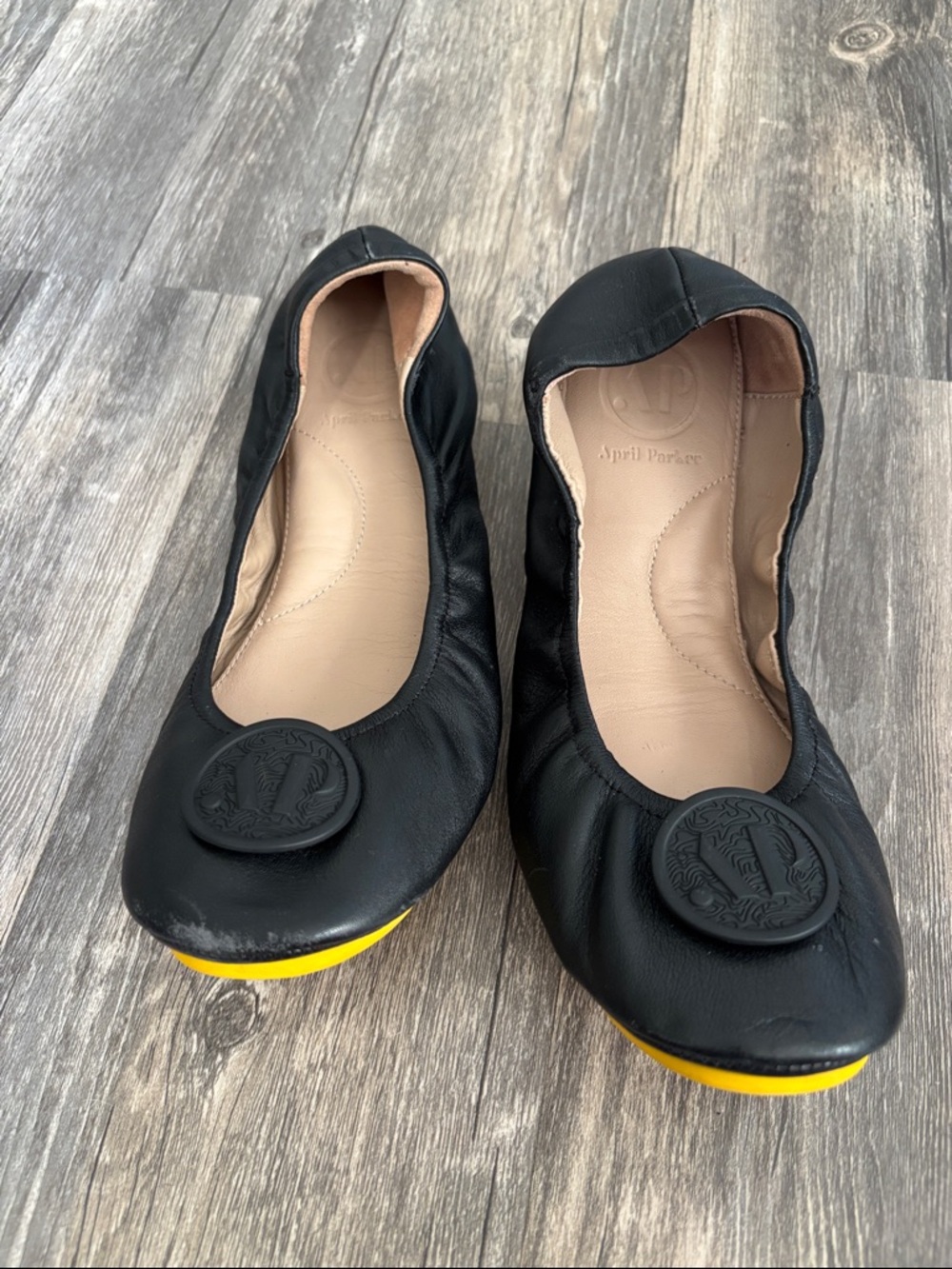 Black Leather Ballet Flats with Yellow Outsole